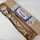A Pelham puppet, Skeleton, in original brown box Strings tangled.