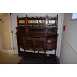 A late 19th century Aesthetic Movement walnut, ebonised and painted side cabinet, the raised back