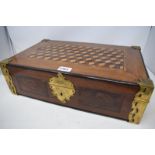 A Continental box, the top with geometric parquetry inlay, and with brass mounts, locked, 48 cm wide