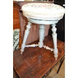 A French painted stool, the revolving top on turned supports