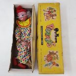 A Pelham puppet, Clown, in a yellow box