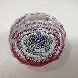 A Whitefriars Millefiore glass paperweight, with multi faceted decoration, one cane dated 1971