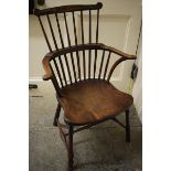 A late 19th century beech, ash and elm stick back kitchen armchair some repairs