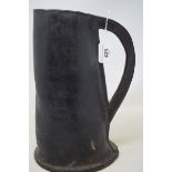 A leatherjack type jug, the base marked 'Welch Jug Royal Militia' (?), 30 cm high Inscription