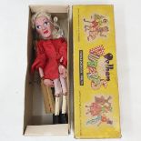 A Pelham puppet, Prince Charming, in a yellow box