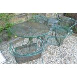 A green painted metal garden table, 94 cm diameter, four garden chairs and a similar smaller