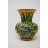 A Chinese yellow ground vase, decorated figures and foliage in green enamel, rim chipped, 12 cm high