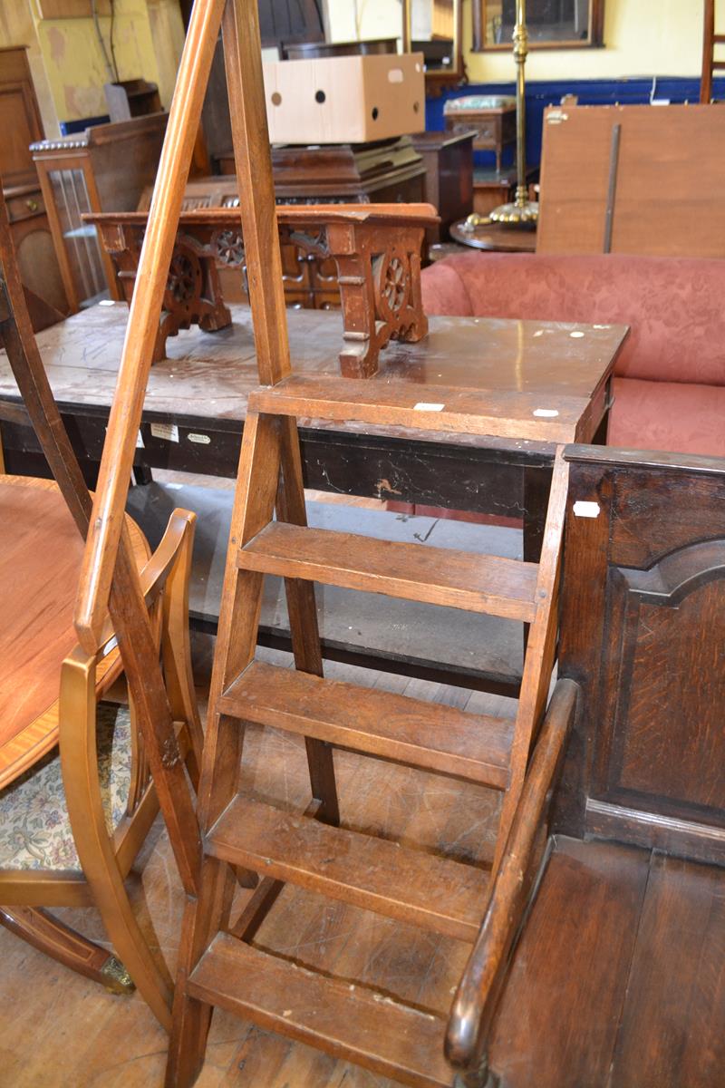 A set of oak library steps, 48 cm wide Top part of grab rail has been repaired. Some worm to the