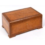 A Dunhill humidor, veneered in burrwood, 35 cm wide, and a horn cigar cutter (2) See illustration