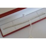 An 18ct white gold RBC diamond line bracelet. Diamonds approx 4.31ct