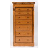 A Victorian secretaire Wellington chest, veneered in birdseye maple, having an arrangement of a