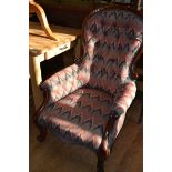 A Victorian mahogany armchair, on cabriole front legs with knurl feet, a George III mahogany bureau,