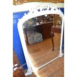 A Victorian painted and carved wood overmantel mirror, 114 cm wide, a bedside cupboard, with printed