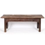 A 19th century oak and elm farmhouse kitchen table, with a three plank top and chamfered square