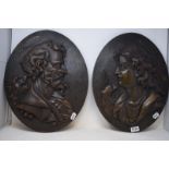 A pair of oval oak panels, carved bust portraits, 46 x 36.5 cm (2)