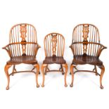 A set of eight 19th century style beach and elm chairs, with pierced vase shaped splats, solid seats