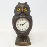 A timepiece, with Arabic numerals, in an owl case, 16.5 cm high Modern