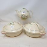 A pair of Susie Cooper tureens and covers and other matching items, some damage