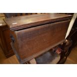 A 19th century oak box, hinges broken, 67 cm wide, a stick back kitchen chair, a chiffoniere base