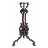 A mahogany jardiniere stand, in the Chippendale taste, carved bell flowers and scrolling acanthus