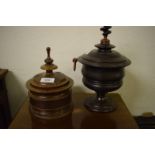 A Dutch treen tobacco jar and cover, 30 cm high, and another similar, 18 cm high Tallest one lacks a