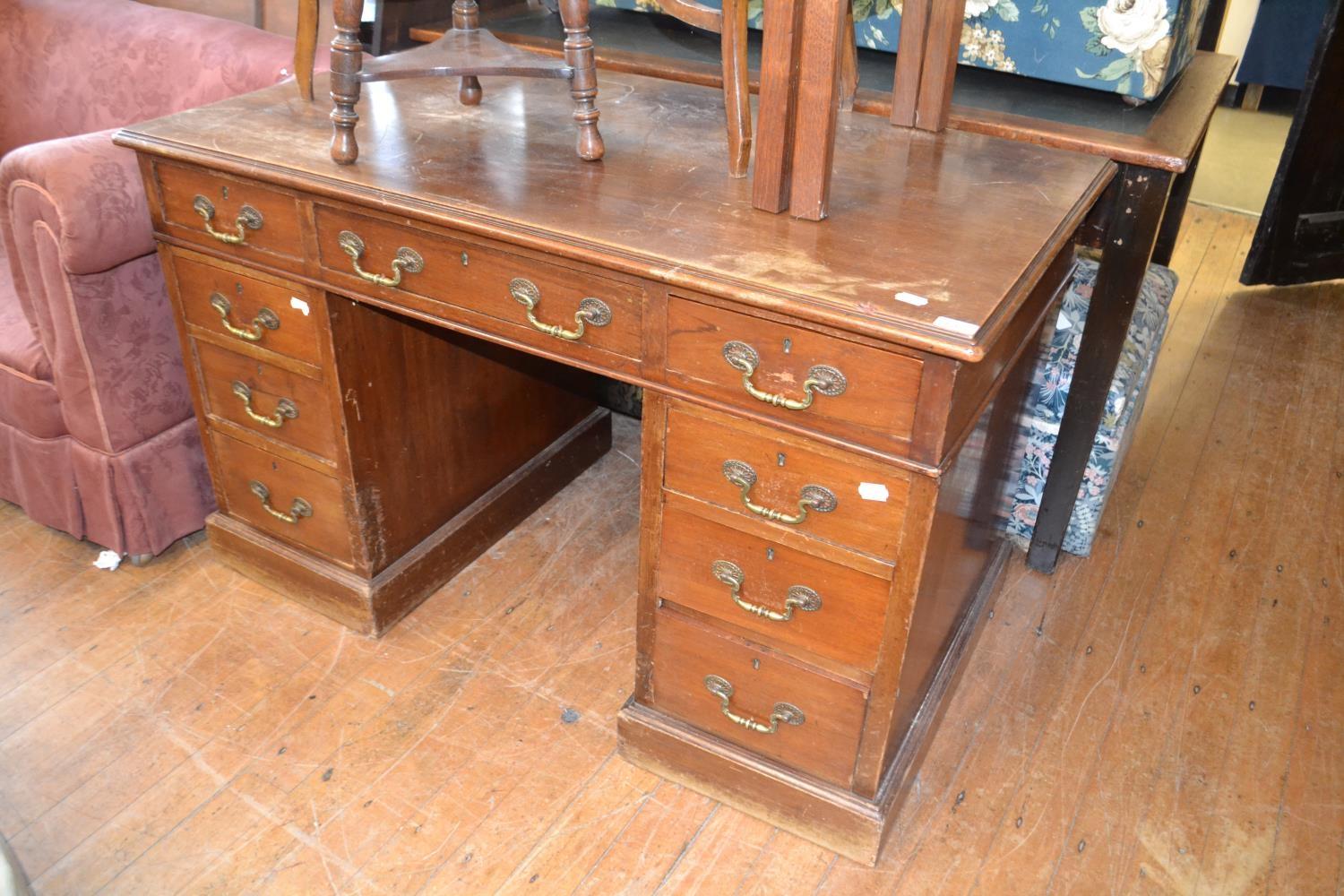 A mahogany pedestal desk, having an arrangement of nine drawers, 122 cm wide - Image 2 of 2