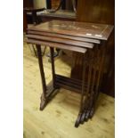 A quartetto of rosewood occasional tables, the tops with brass and other inlay in the Japanese