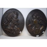 A pair of oval oak panels, carved bust portraits, 46 x 36.5 cm (2)