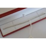 An 18ct white gold RBC diamond line bracelet. Diamonds approx 4.31ct