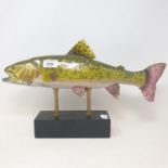 A pottery fish, on a stand, 24 cm high