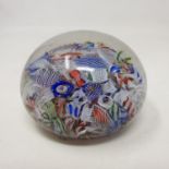 A Baccarat scrambled glass paperweight, with various latticino and coloured glass canes, 6.2 cm