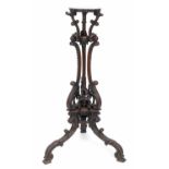 A mahogany jardiniere stand, in the Chippendale taste, carved bell flowers and scrolling acanthus