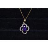 A 9ct gold, amethyst and diamond necklace