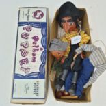 A Pelham puppet, Pirate, and another puppet, in a brown box (2)