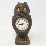 A timepiece, with Arabic numerals, in an owl case, 16.5 cm high