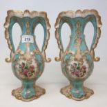 A pair of Victorian style vases, with rococo style decoration, 25.5 cm high
