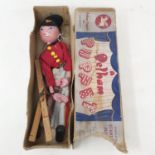 A Pelham puppet, BOM, in a brown box