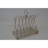 A novelty golfing toast rack