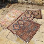 A Turkey style rug, 178 x 110 cm, and two other rugs (3)