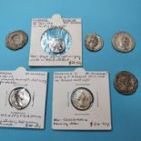 A Faustina II silver denarius, a Trajan (AD 98-117) silver denarius, and five other coins (7)