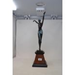 An Art Deco style painted bronze dancer, on a marble base, 55 cm high Report by RB Modern