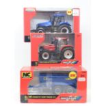 A collection of Britains tractors and agricultural machinery, all boxed, to include 40718,