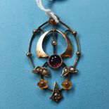 An Art Nouveau 9ct gold seed pearl and garnet pendant, 2g (all in), 4 cm Report by JS Stamped 9ct