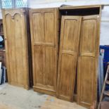 A stripped pine cupboard with a single door, adapted from a larger piece of furniture, 71 cm wide,