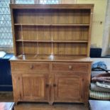 A stripped pine kitchen dresser, 166 cm wide