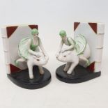 A pair of porcelain bookends, with ladies riding pigs, 15 cm high (2) Report by RB Modern