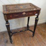 A French ebonised and amboyna planter, the lift out top with floral marquetry decoration, on