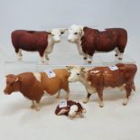 A Beswick Hereford cow, 1360, a Hereford bull, 163A, a Hereford calf sat, a Hereford cow, 948, and a