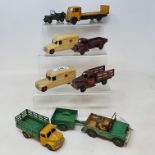 A Dinky Toys Daimler ambulance, another, and other assorted vehicles