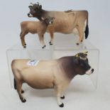 A Beswick Jersey bull, 1422, matt, a Jersey cow, 1345, matt, and a Jersey calf, 1249D, matt, all